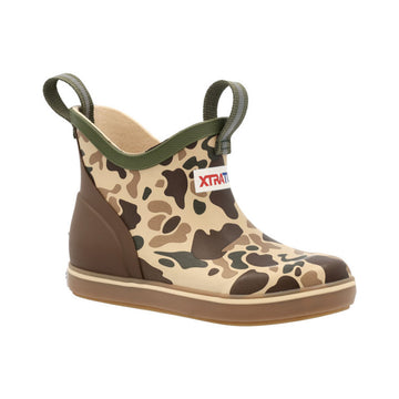 Camouflage-patterned boot with green handles on a white background
youth boot